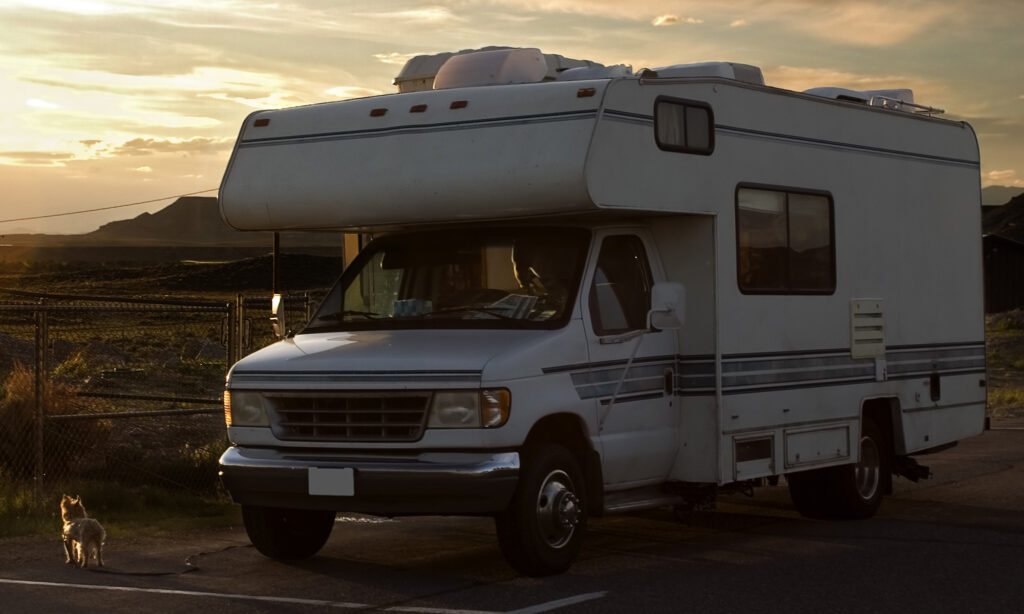 An RV Parked in front of a beautiful sunset