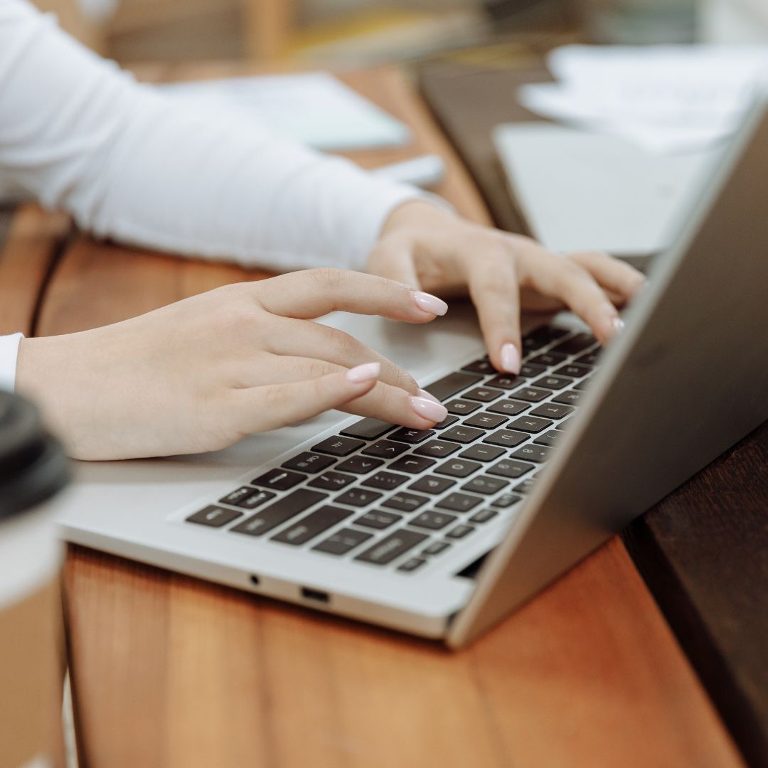 person using laptop